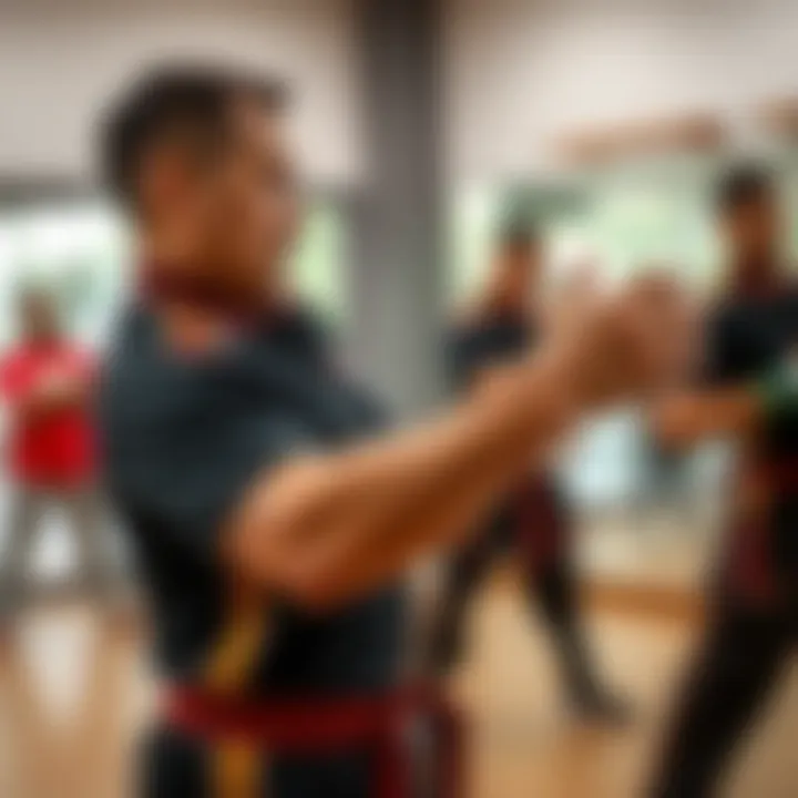 Instructor demonstrating self-defense moves in a class setting.